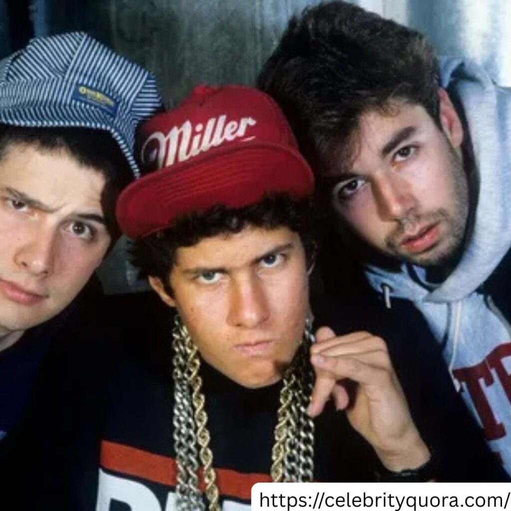 The Beastie Boys, including Ad-Rock, are captured in a close-up shot.