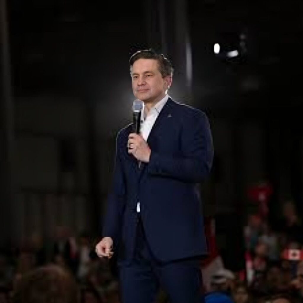 Pierre Poilievre  is on the stage and holding mic. 