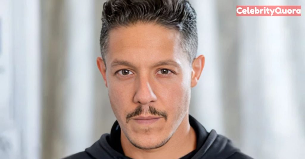  Close-up of actor Theo Rossi looking directly at the camera.