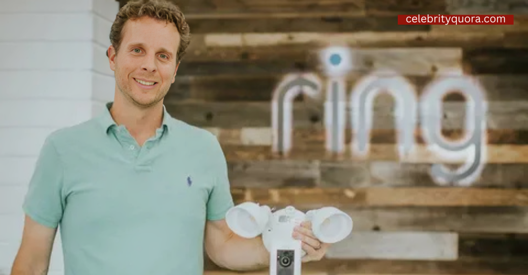 jamie siminoff holding a door bell